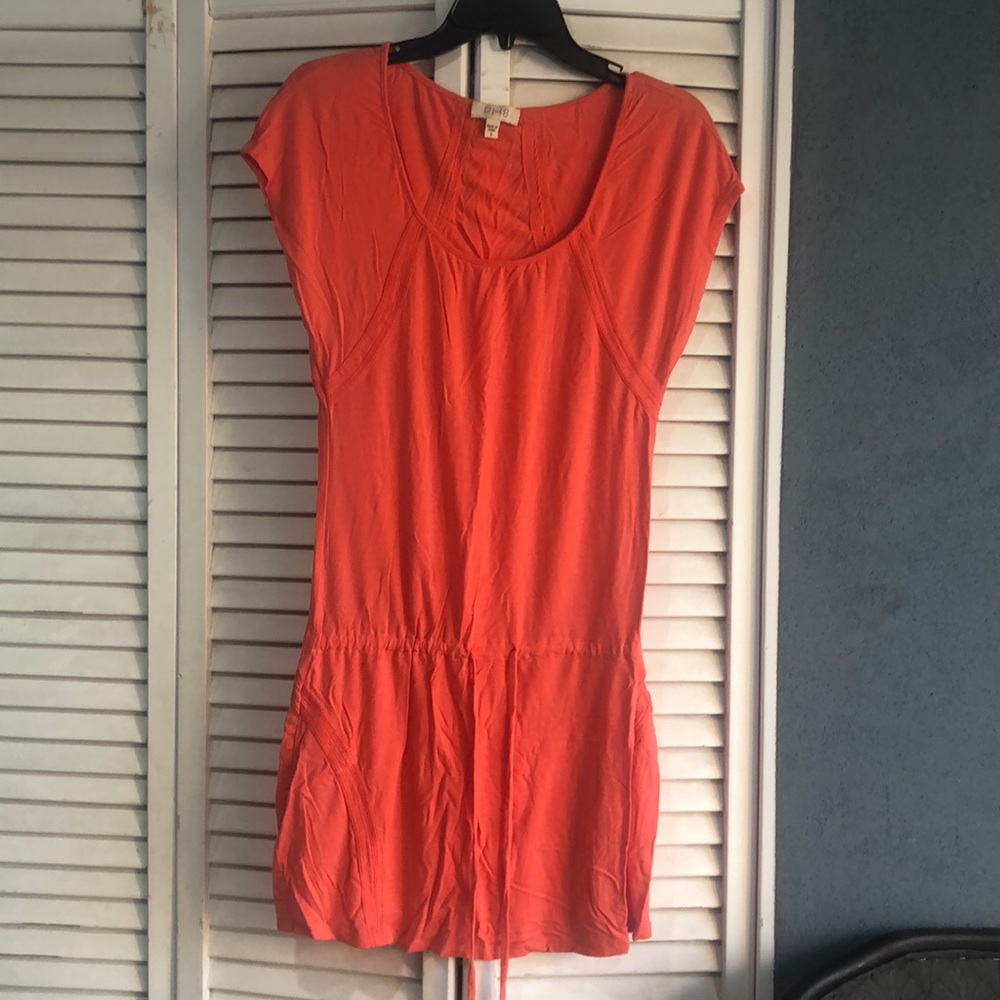 Salmon colored bikini bathing suit cover-up.